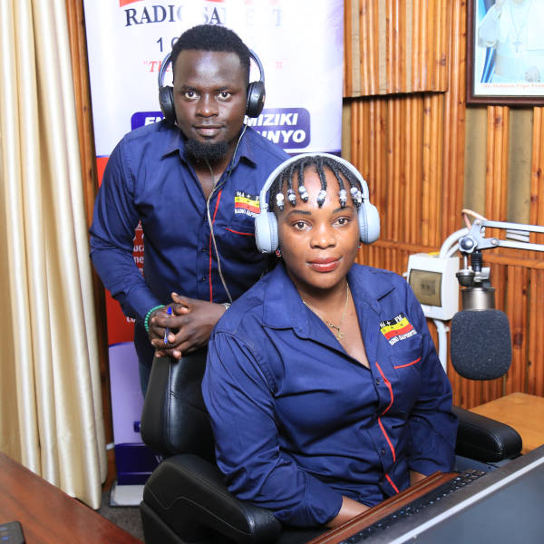 Jimmy Jacobs with Sarah Muchuzi, hosts for Sagala Agalamidde on Radio Sapientia